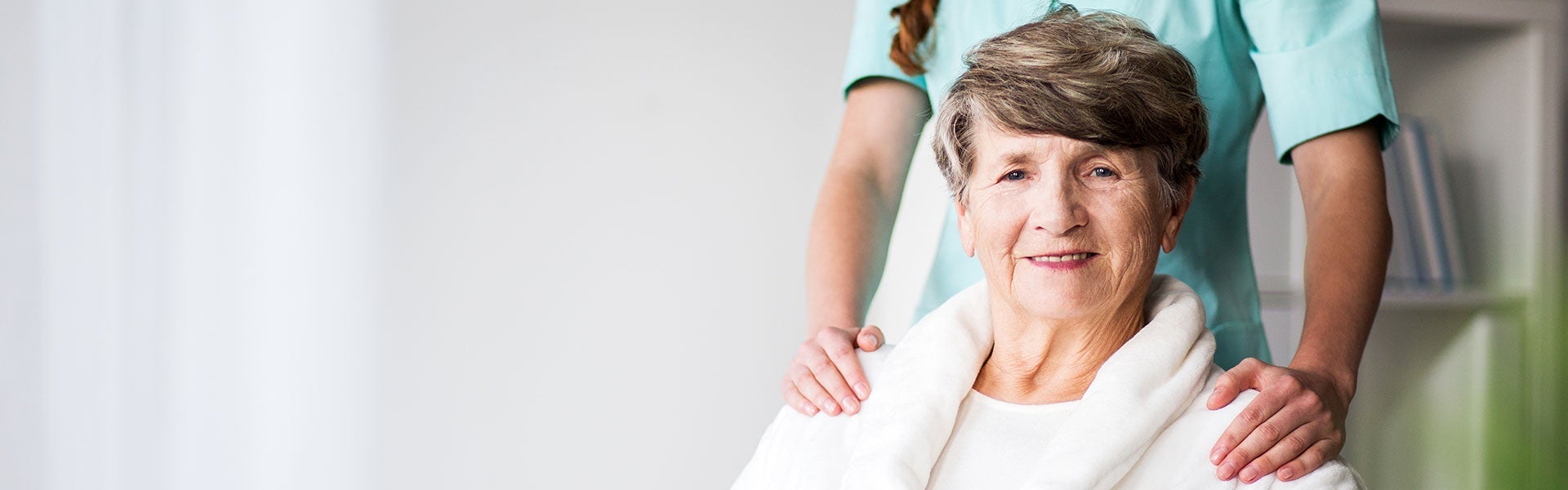 image of an elderly woman with a nurse